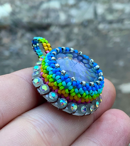 Beaded glass blown flower pendant