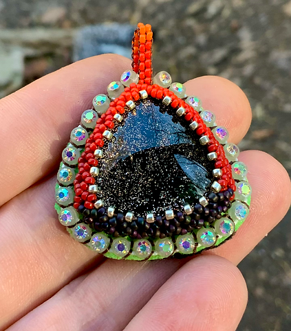 Black to red ombré beaded pendant