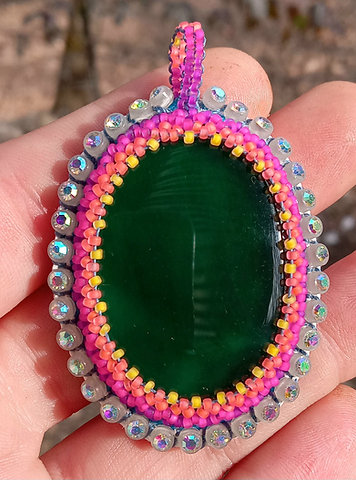 Glow in the dark green onyx beaded pendant