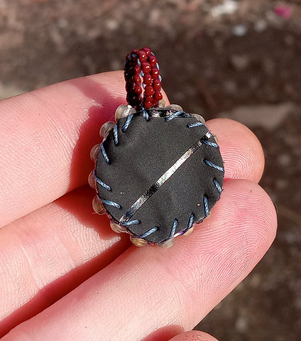 Glow in the dark beaded tigers eye pendant