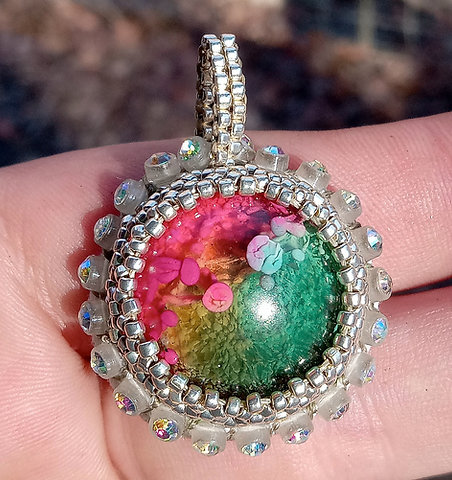 Silver rainbow beaded pendant