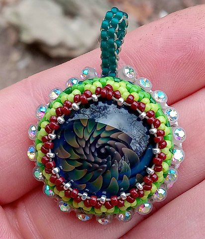 Fumed flower burst beaded pendant