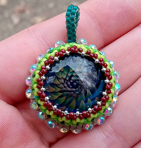 Fumed flower burst beaded pendant