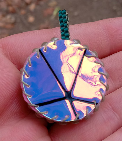 Fumed flower burst beaded pendant