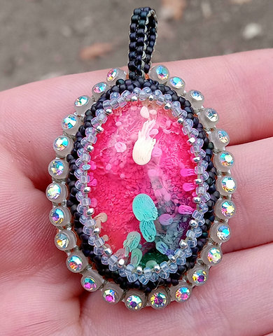 Sparkle lava jellyfish beaded pendant