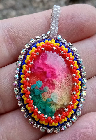 Primary rainbow fungi hill beaded pendant