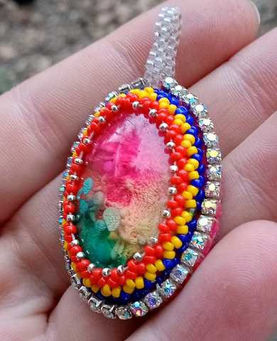 Primary rainbow fungi hill beaded pendant