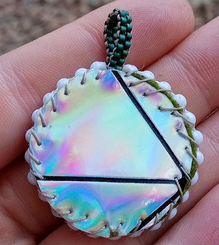 Glow baby beaded pendant