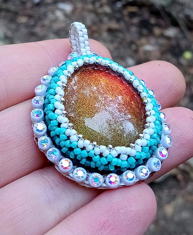 Fire and ice bead embroidered pendant