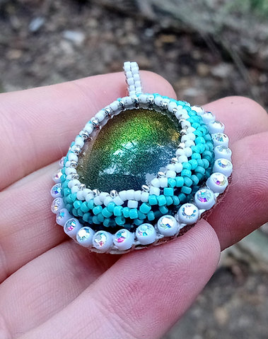 Fire and ice bead embroidered pendant