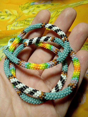 Sandy Teal and sunrise rainbow with black and white peyote stitched necklace