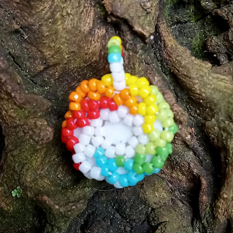 Blue eyeball with rainbow beadwork