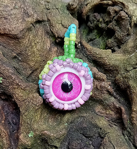 Pink eyeball eastery beaded pendant