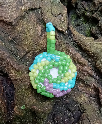 Pink eyeball eastery beaded pendant