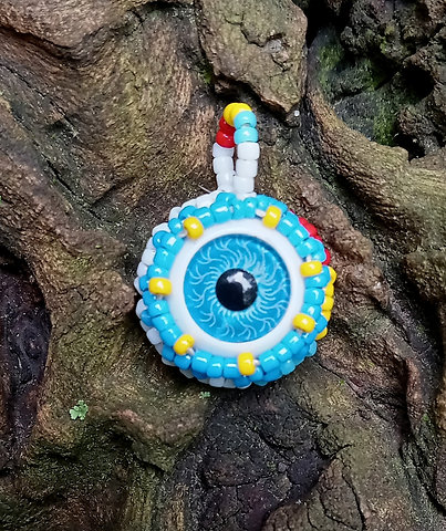 Blue primary beaded eye pendant