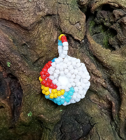 Blue primary beaded eye pendant