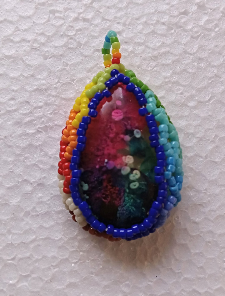 Rainbow and pinks beaded pendant