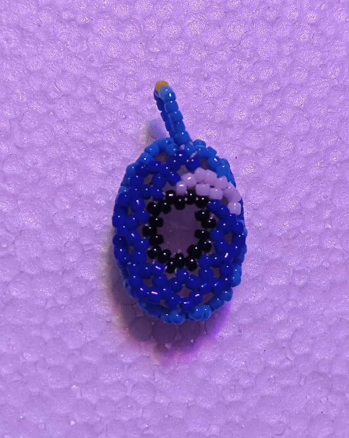 Beaded rutilated quartz pendant