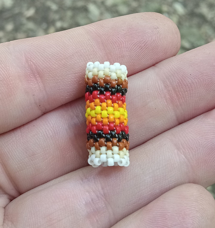 Firey peyote stitched hair bead