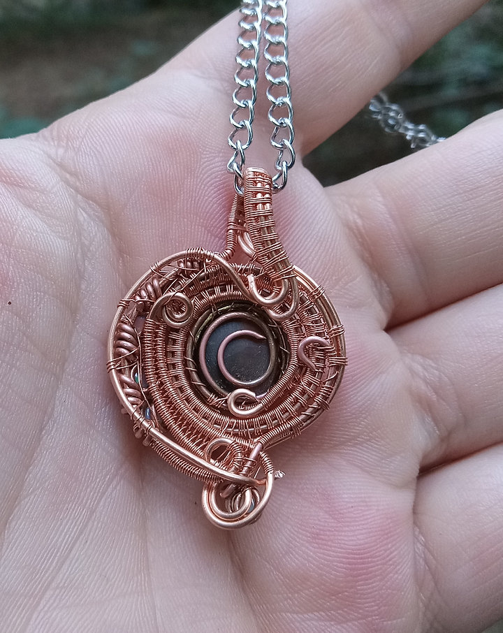 Ethiopian opals wrapped in copper and some brass pendant