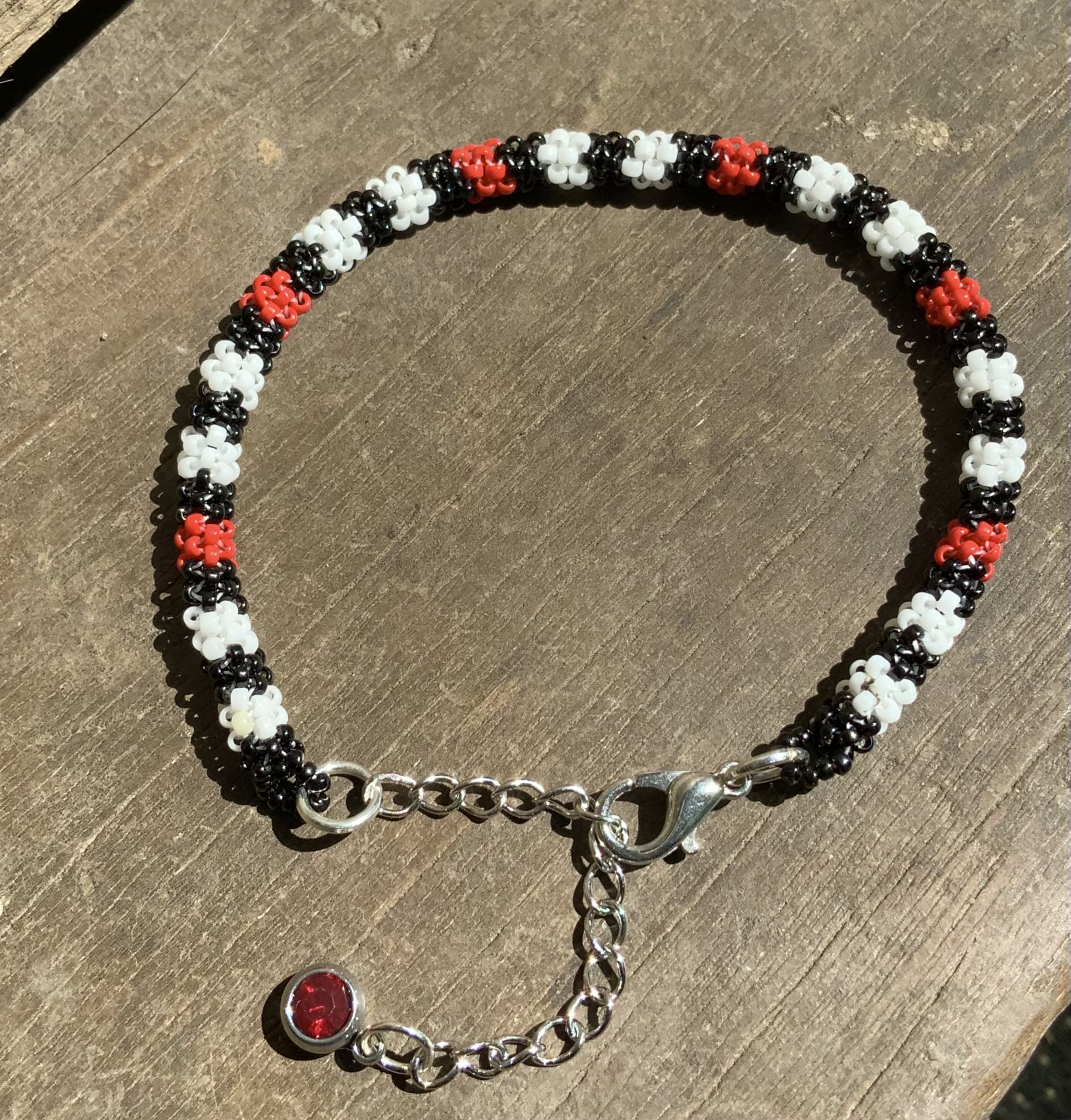Black white and red all over beaded bracelet