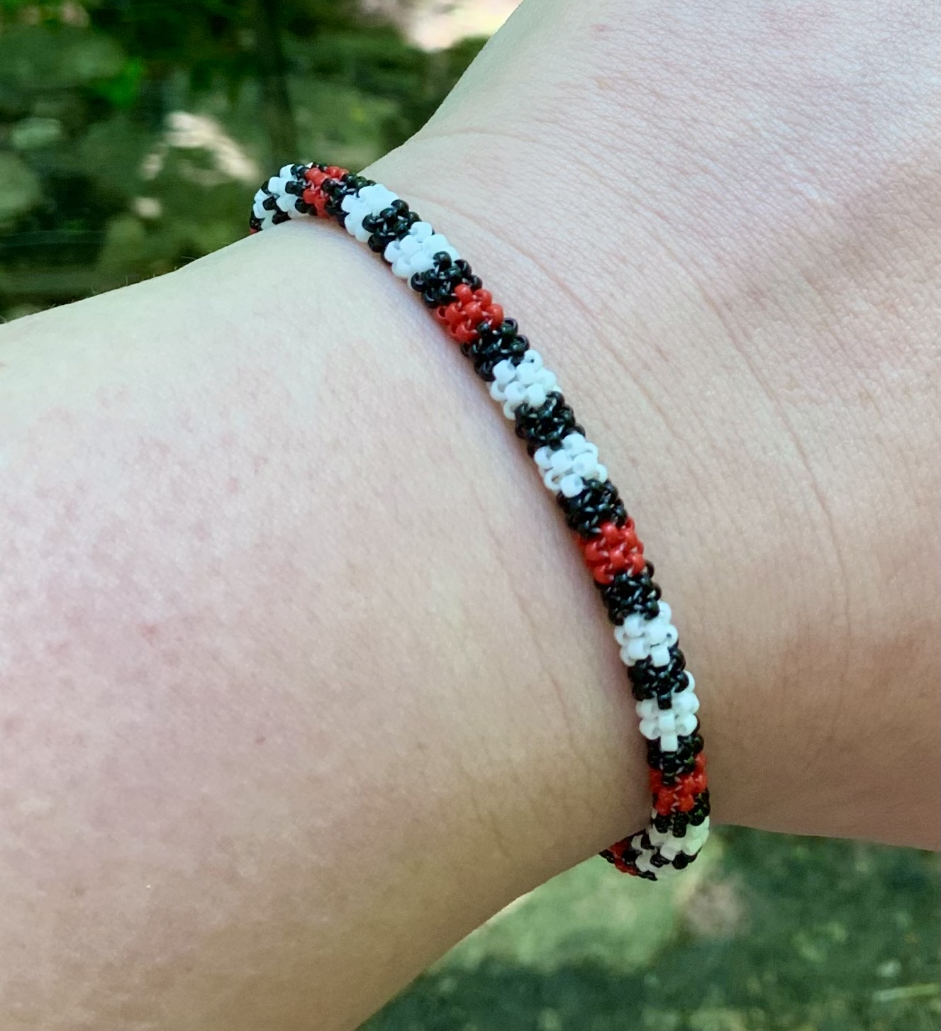 Black white and red all over beaded bracelet