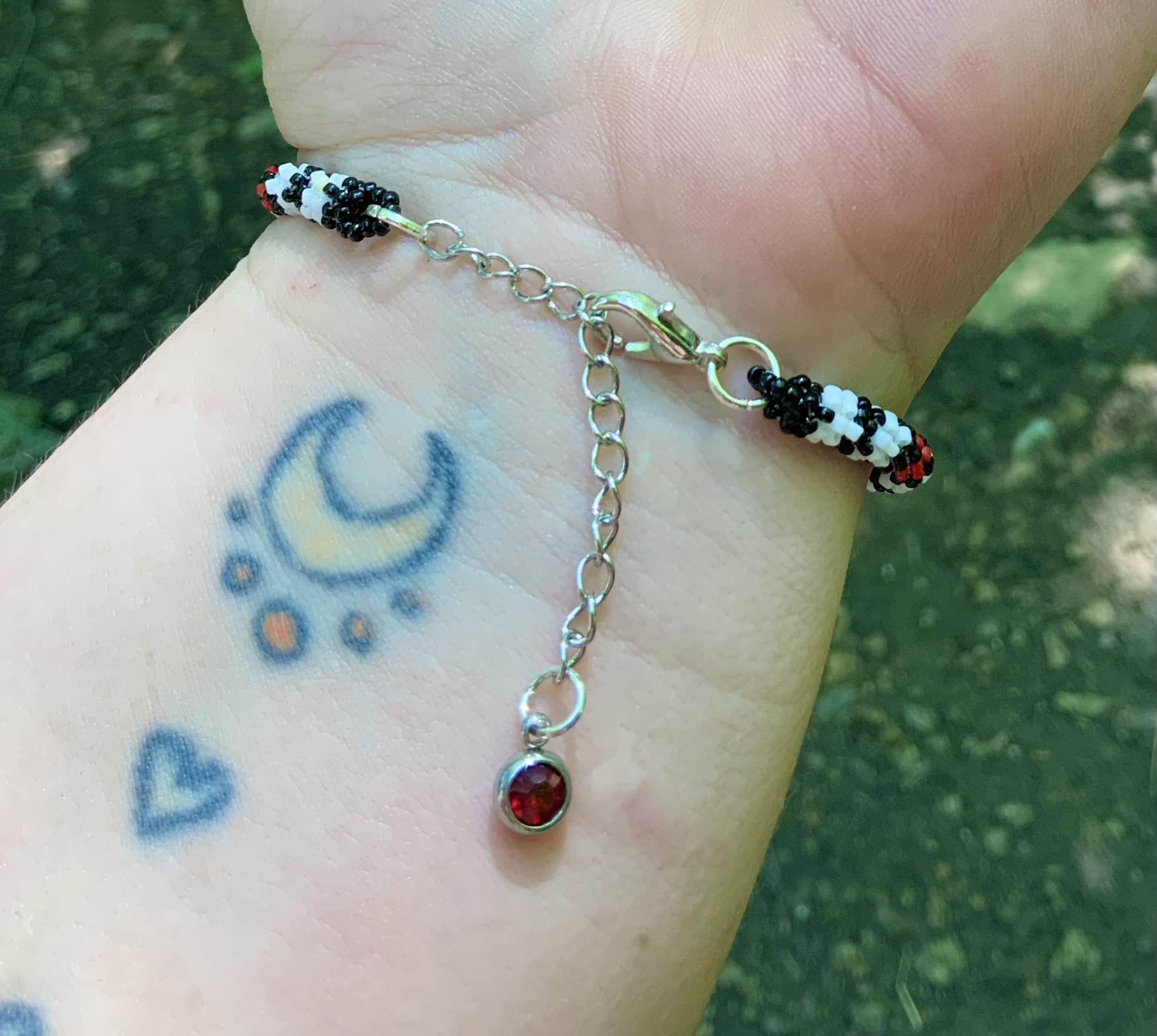 Black white and red all over beaded bracelet