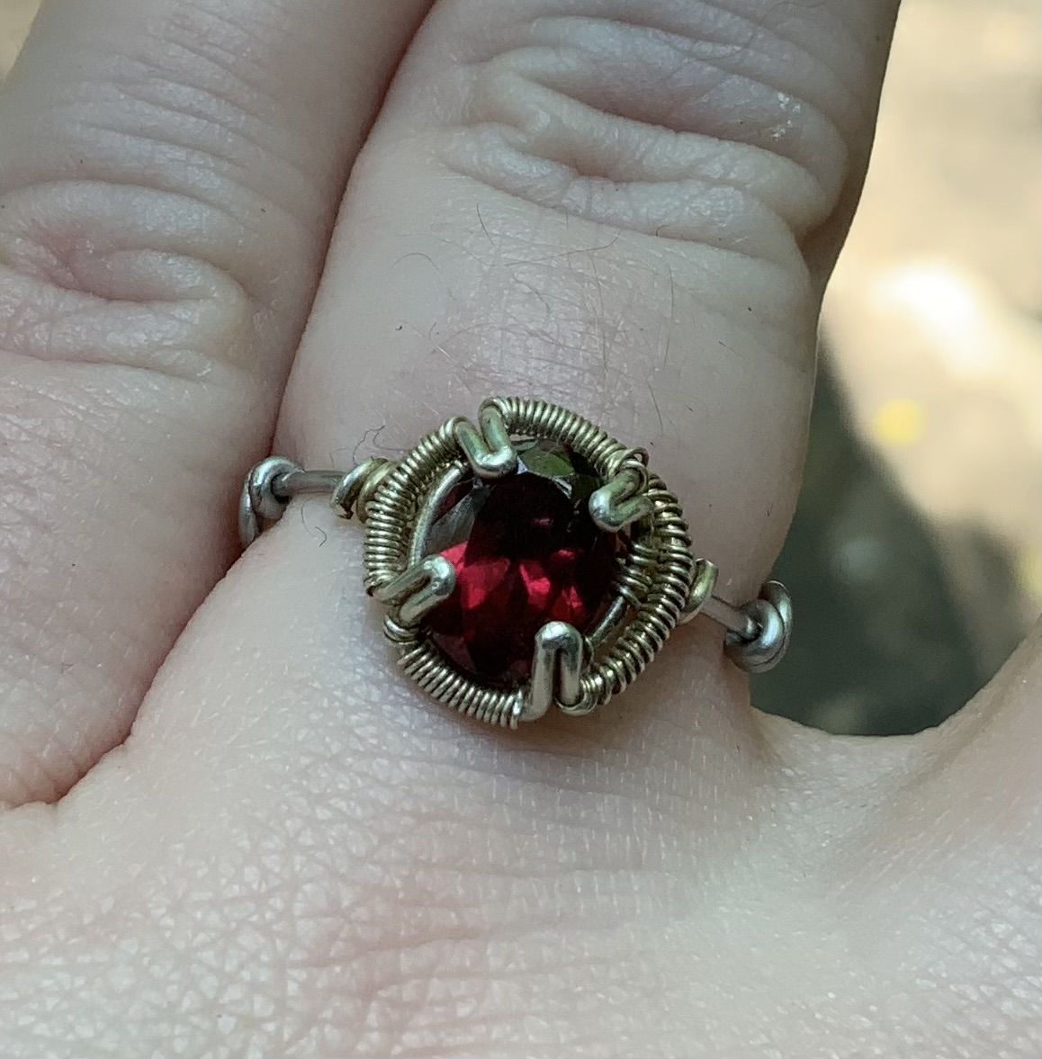 Adjustable wire wrapped garnet ring