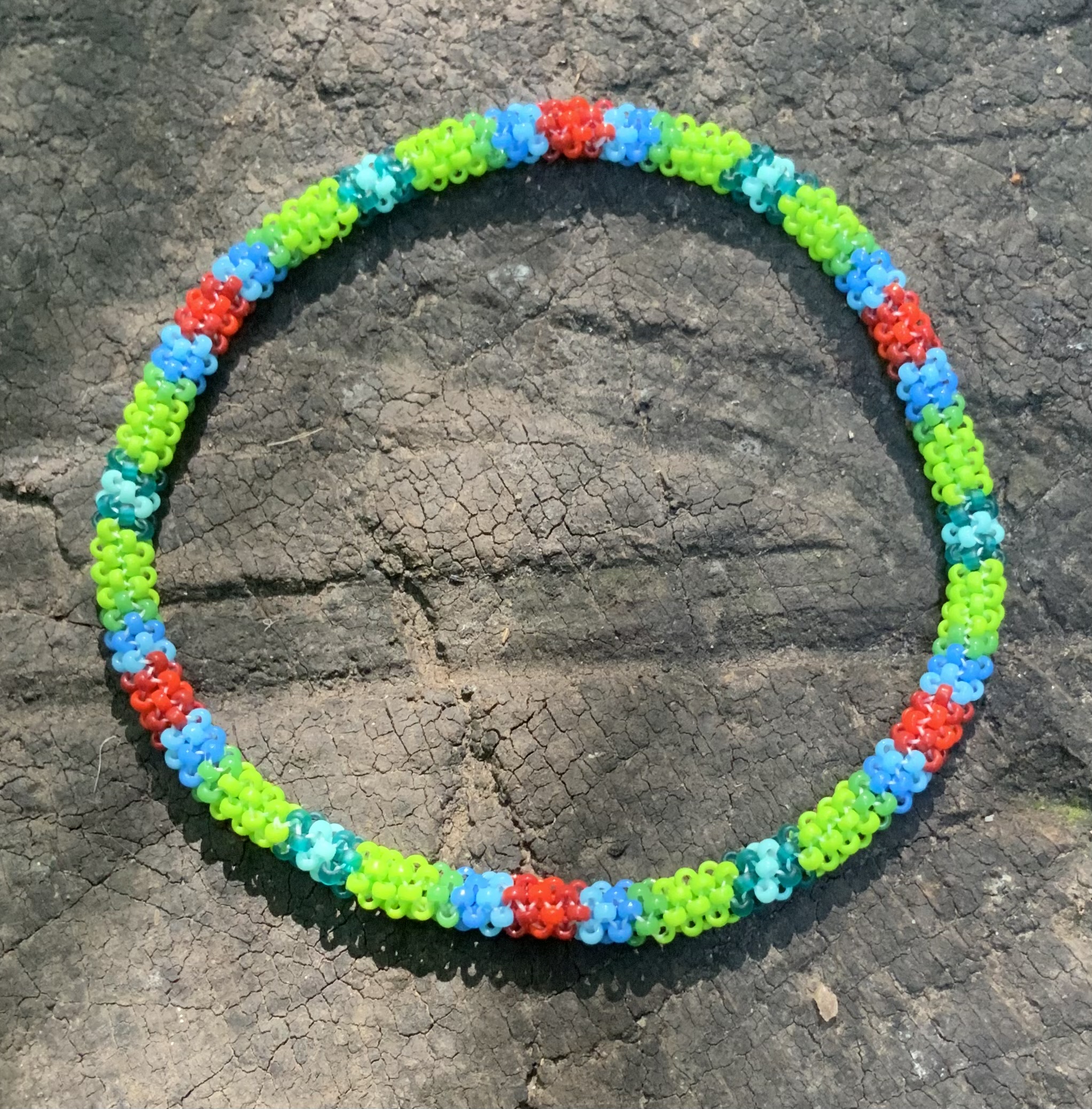 Green lava grassy skies beaded bracelet