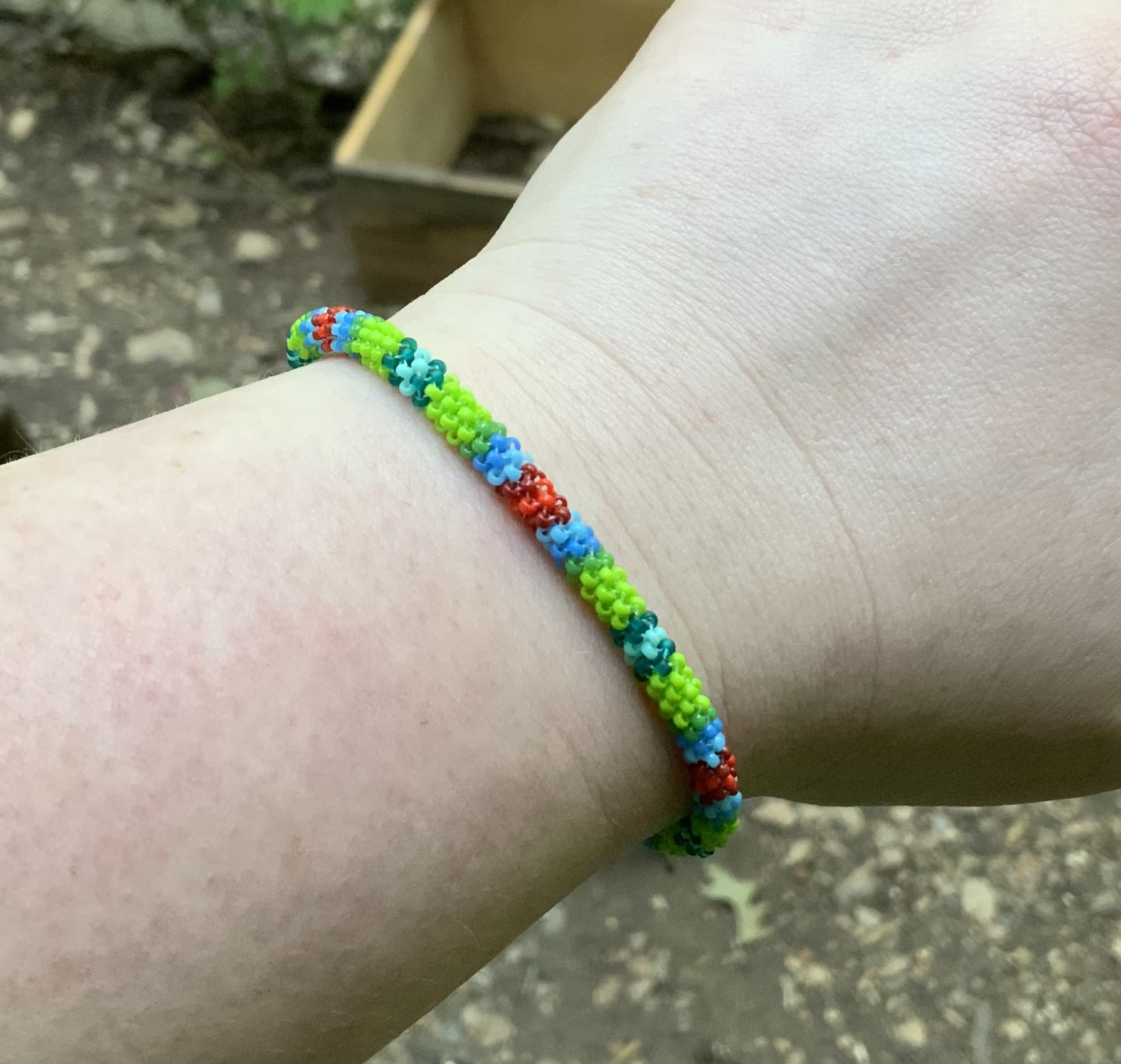 Green lava grassy skies beaded bracelet