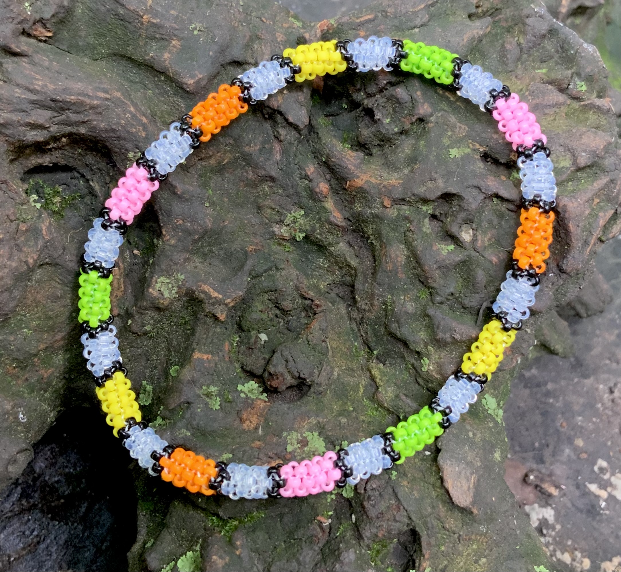 Pastel partial rainbow and clear beaded bracelet 