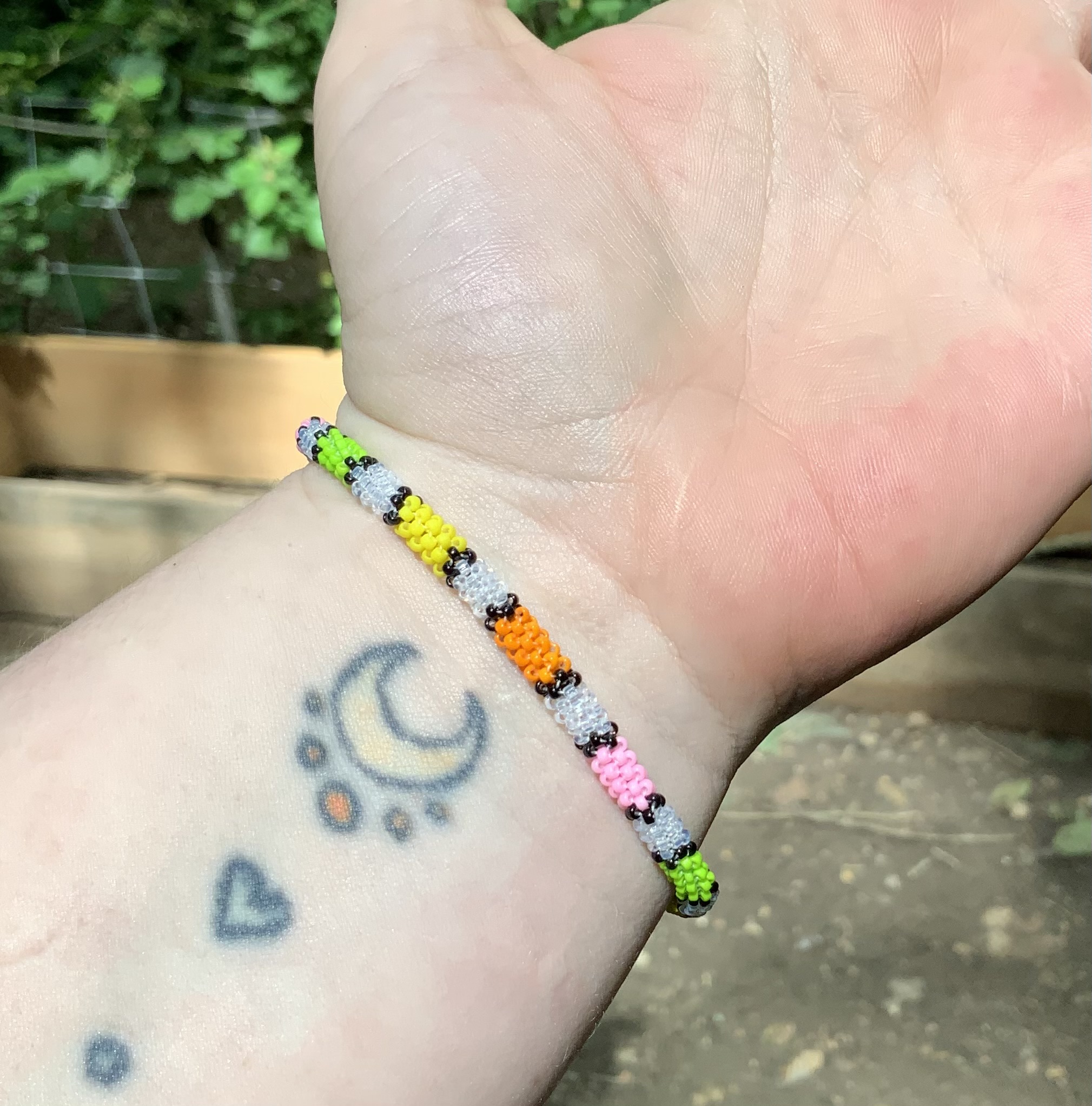 Pastel partial rainbow and clear beaded bracelet 