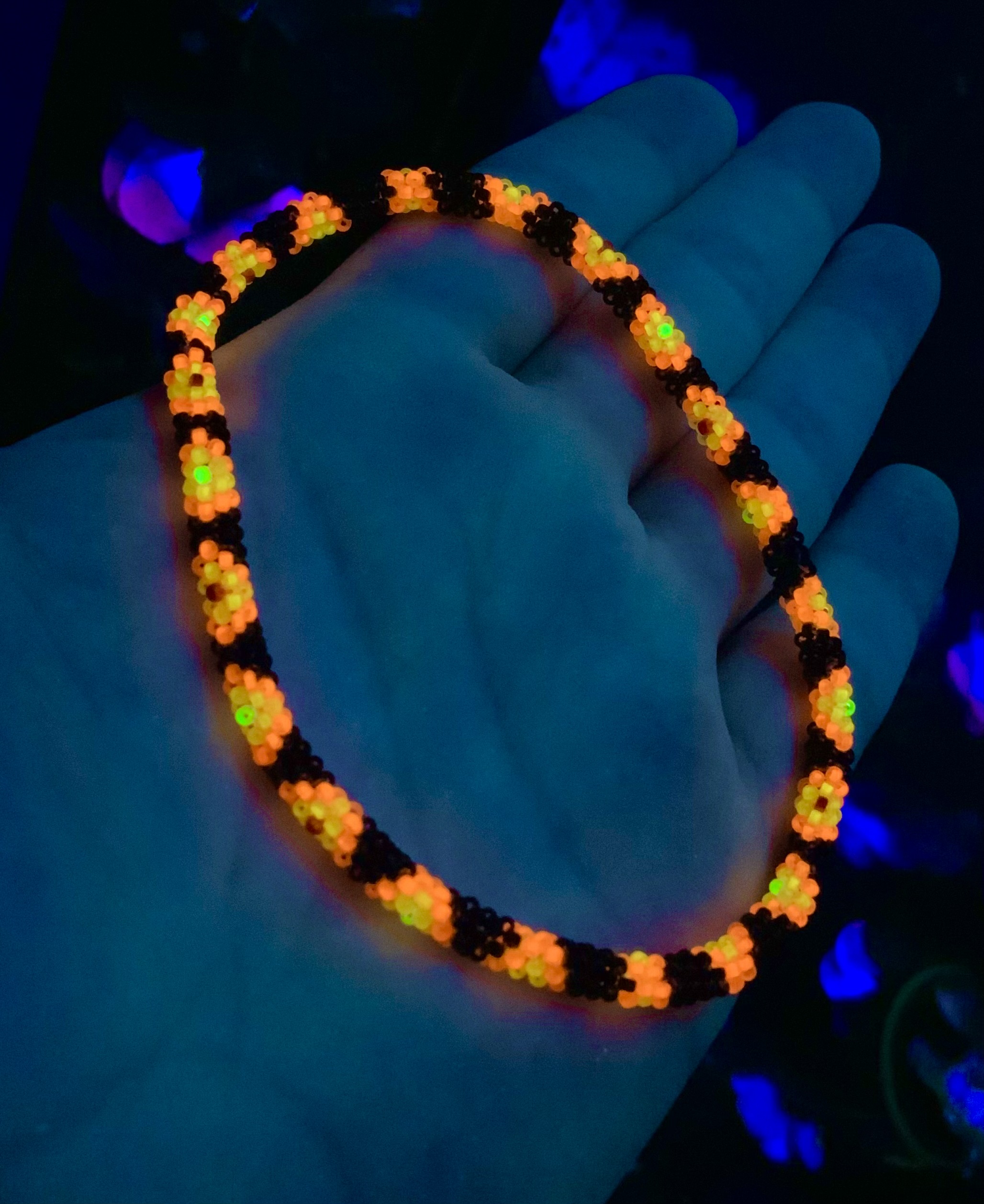 Custom orange and black snake beaded bracelet 