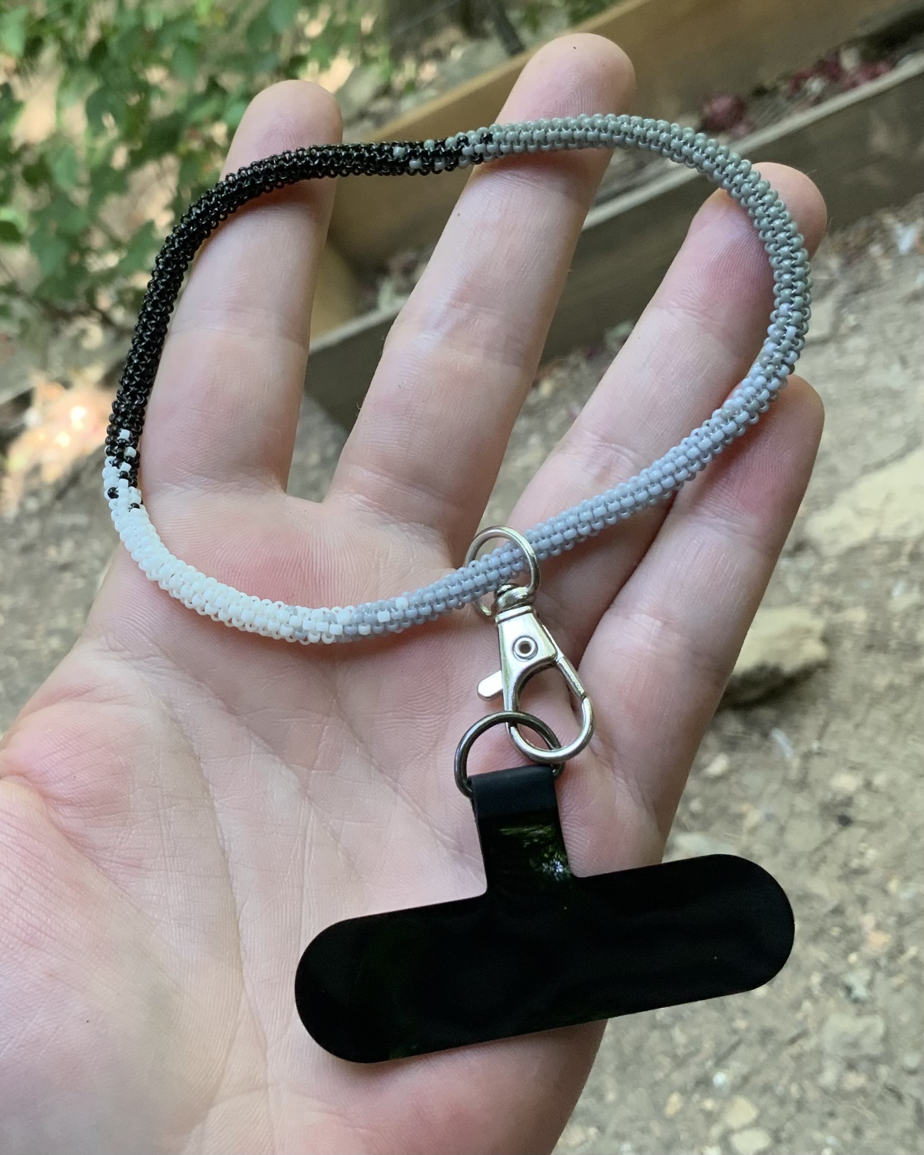 Black to white ombré beaded wristlet  