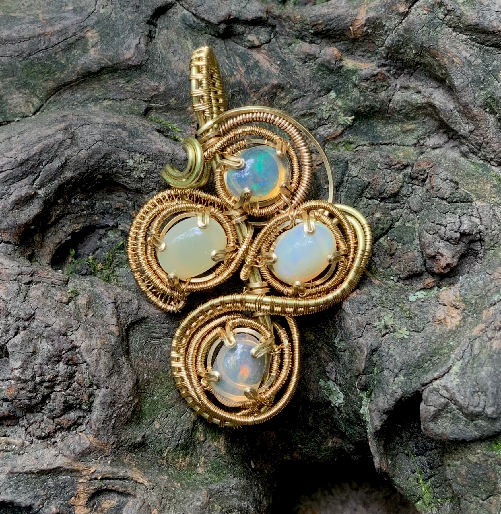 Super opal wire wrapped brass pendant 