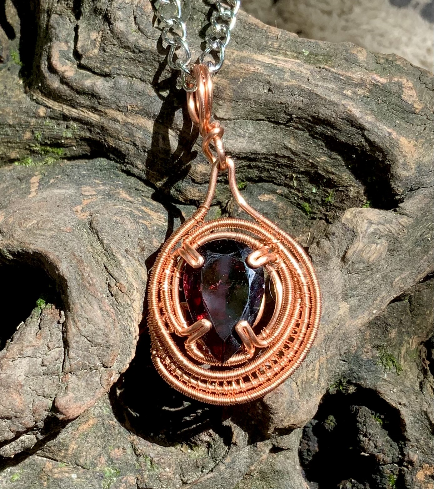 Garnet wire wrapped copper pendant