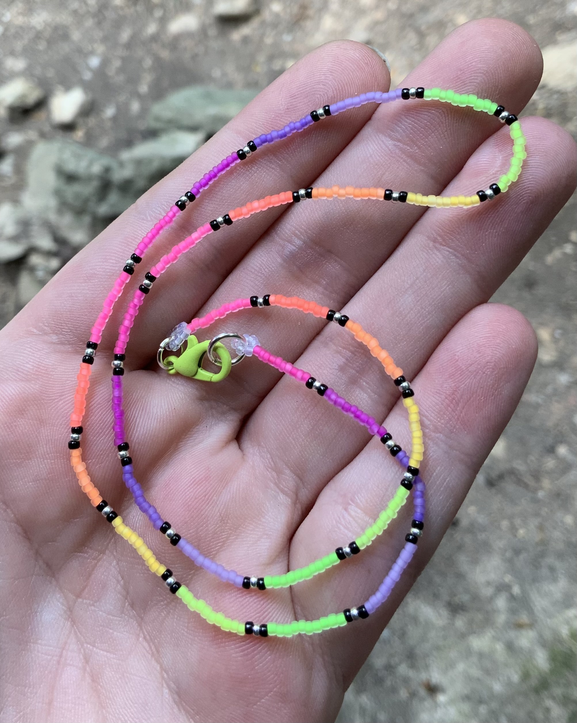 Blacklight reactive neon rainbow beaded chain