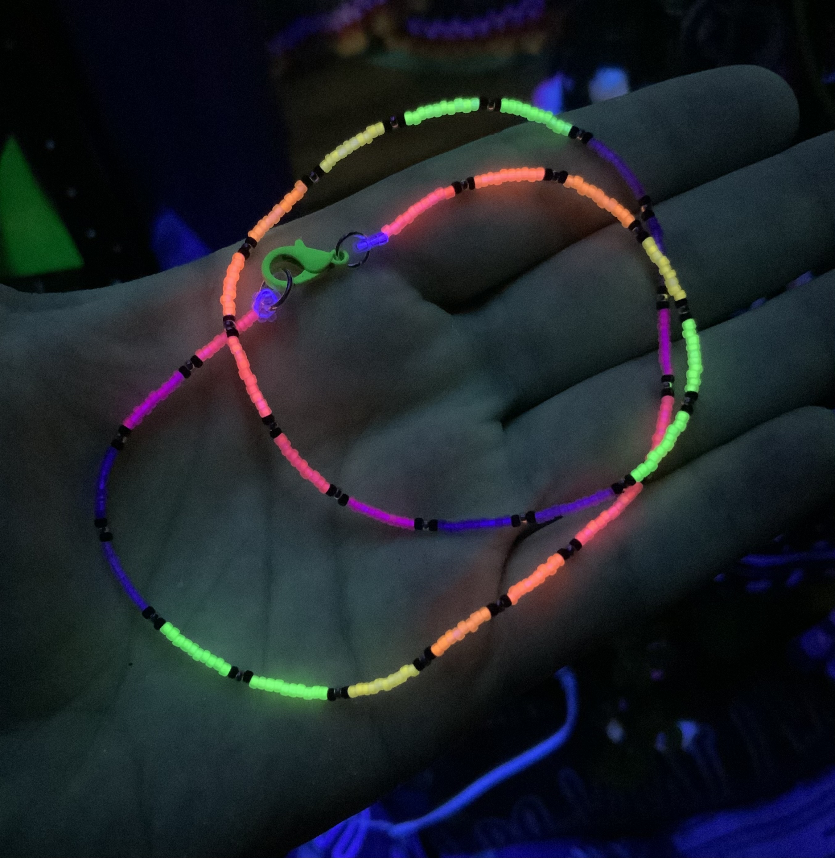 Blacklight reactive neon rainbow beaded chain