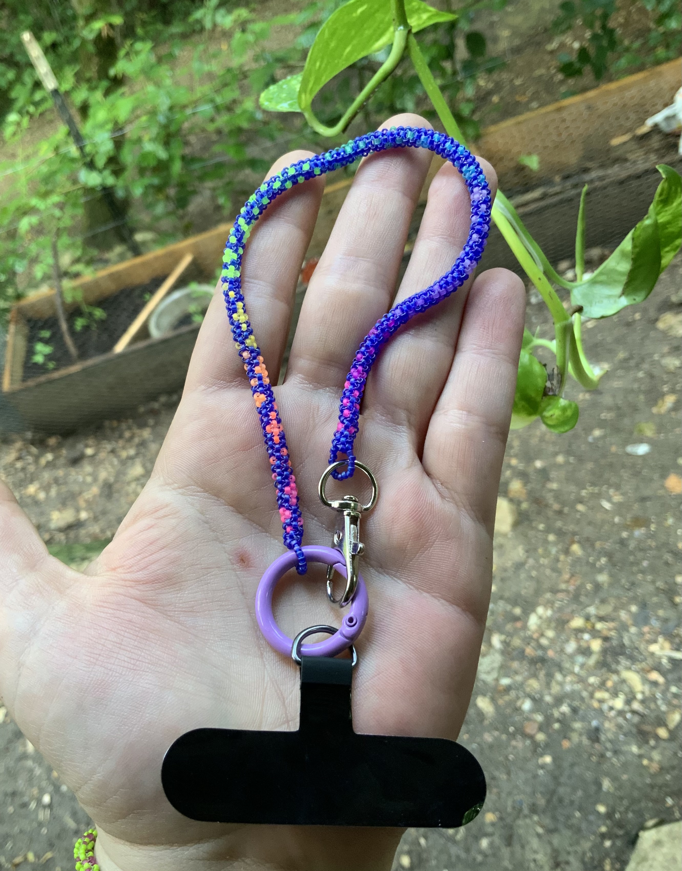 Peacock blue rainbow ombré beaded phone wristlet