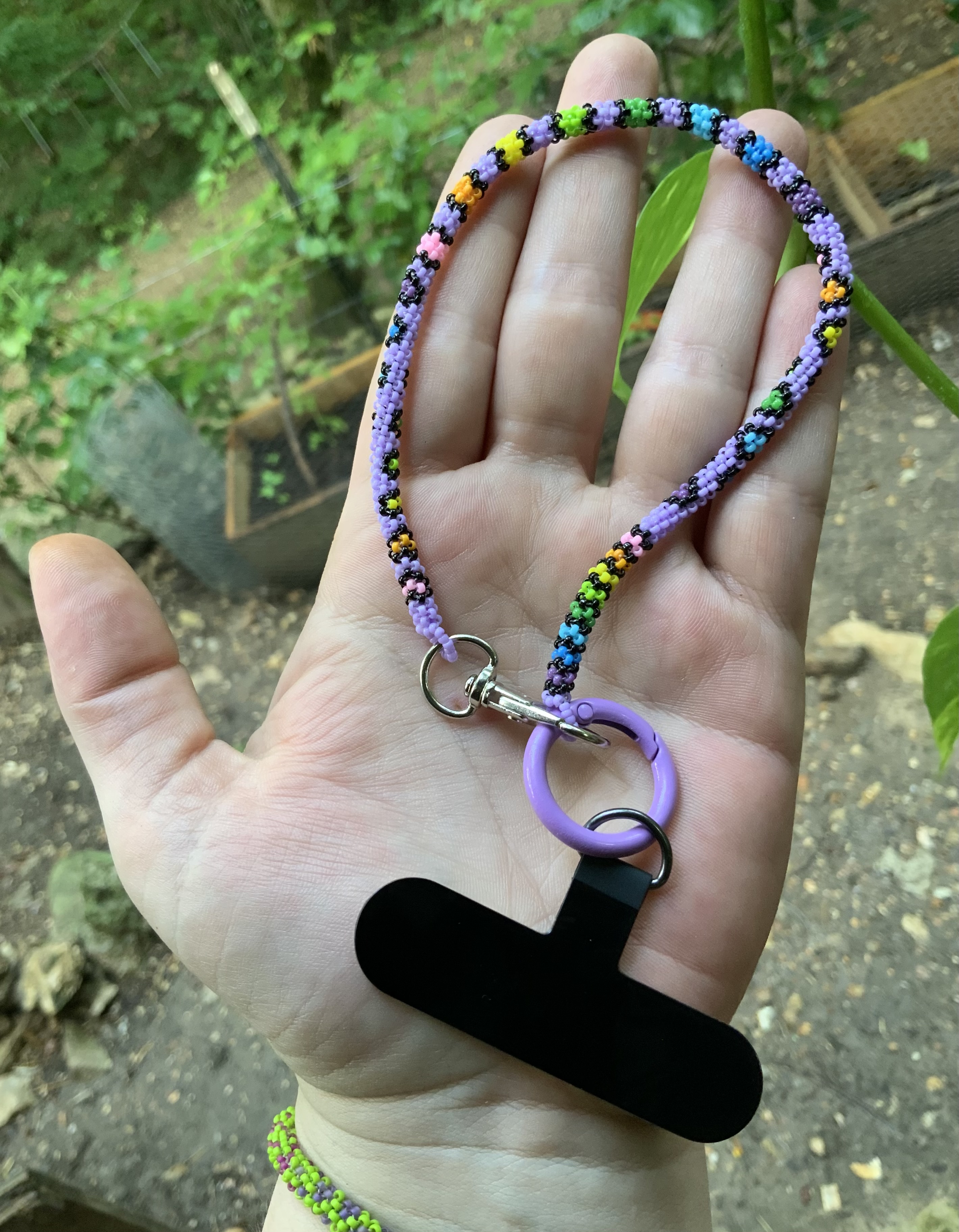 Purple random rainbows beaded wristlet 