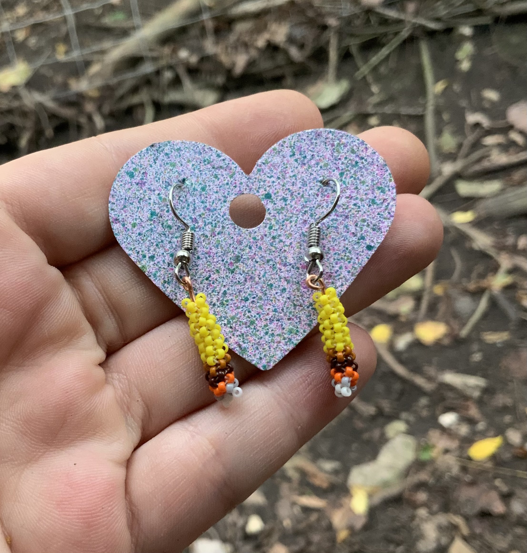 Banana beaded roach earrings