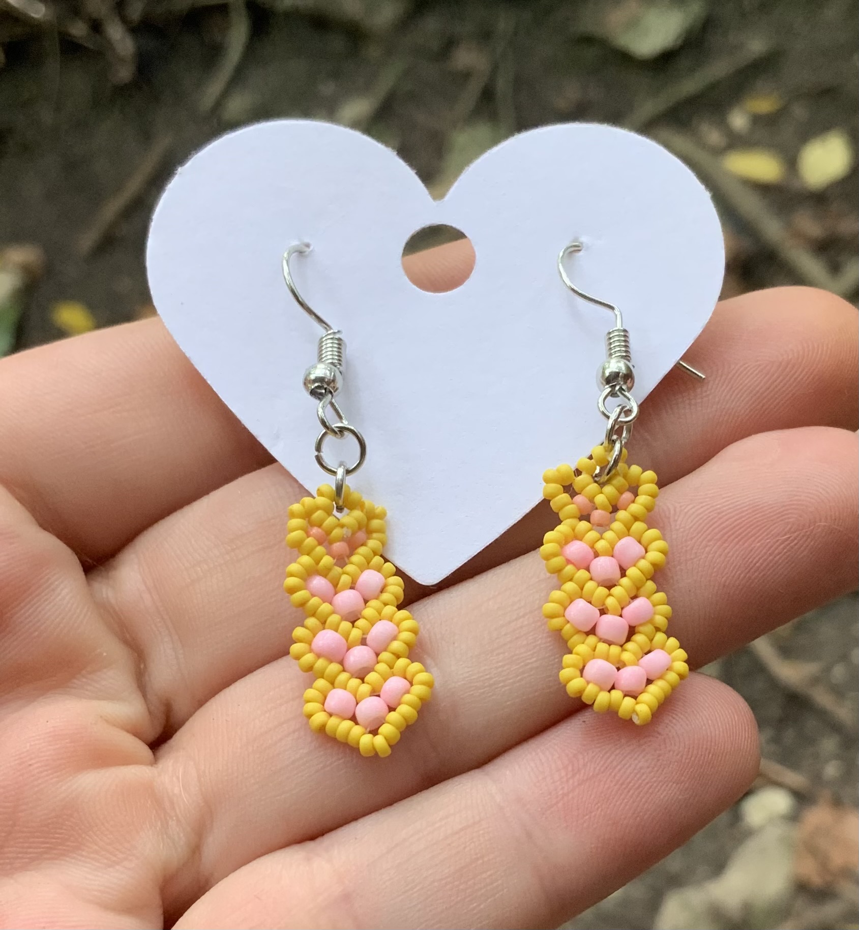 Golden pink beaded heart earrings