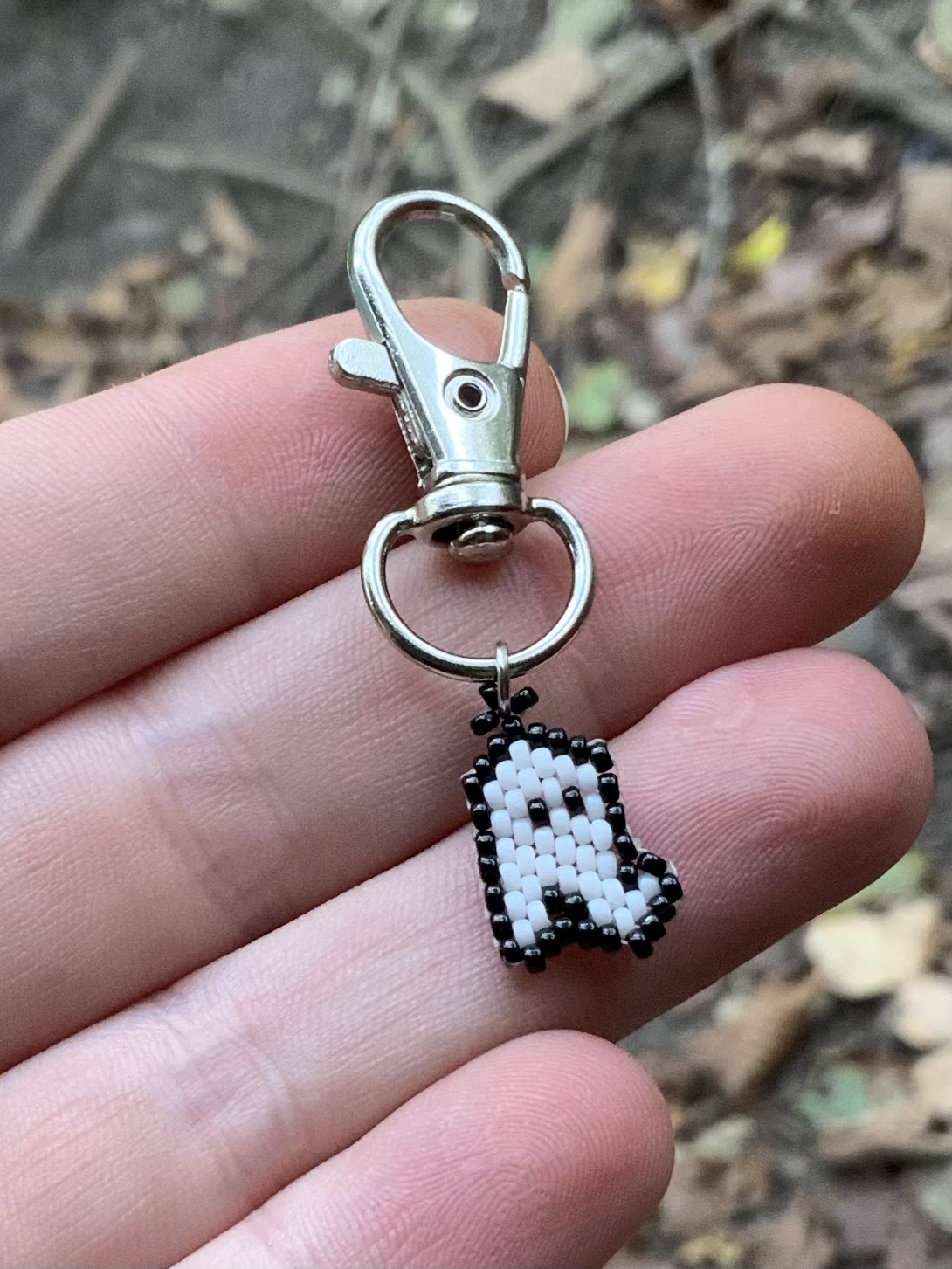 Tiny beaded ghost charm
