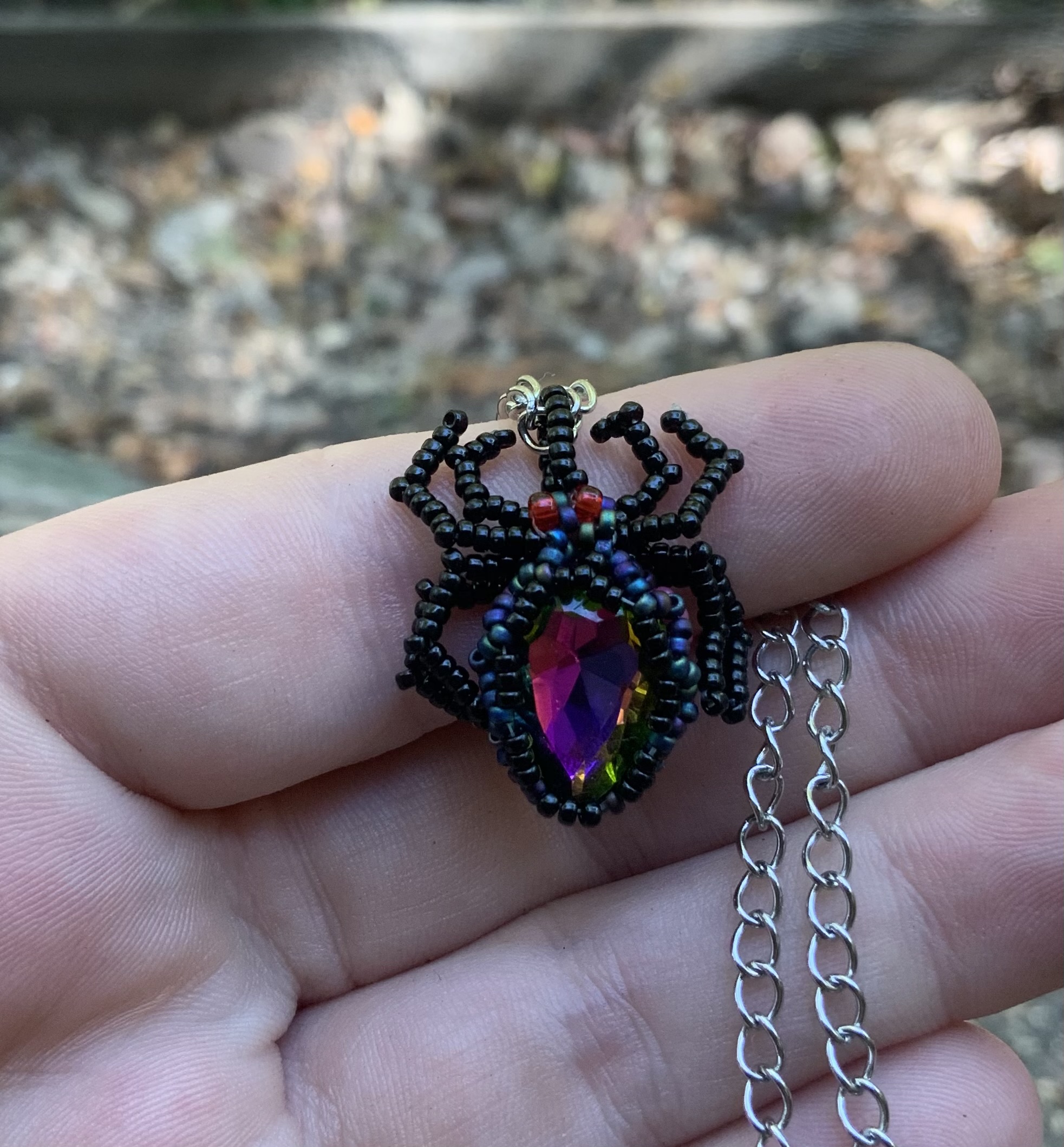 Little spider spood beaded pendant