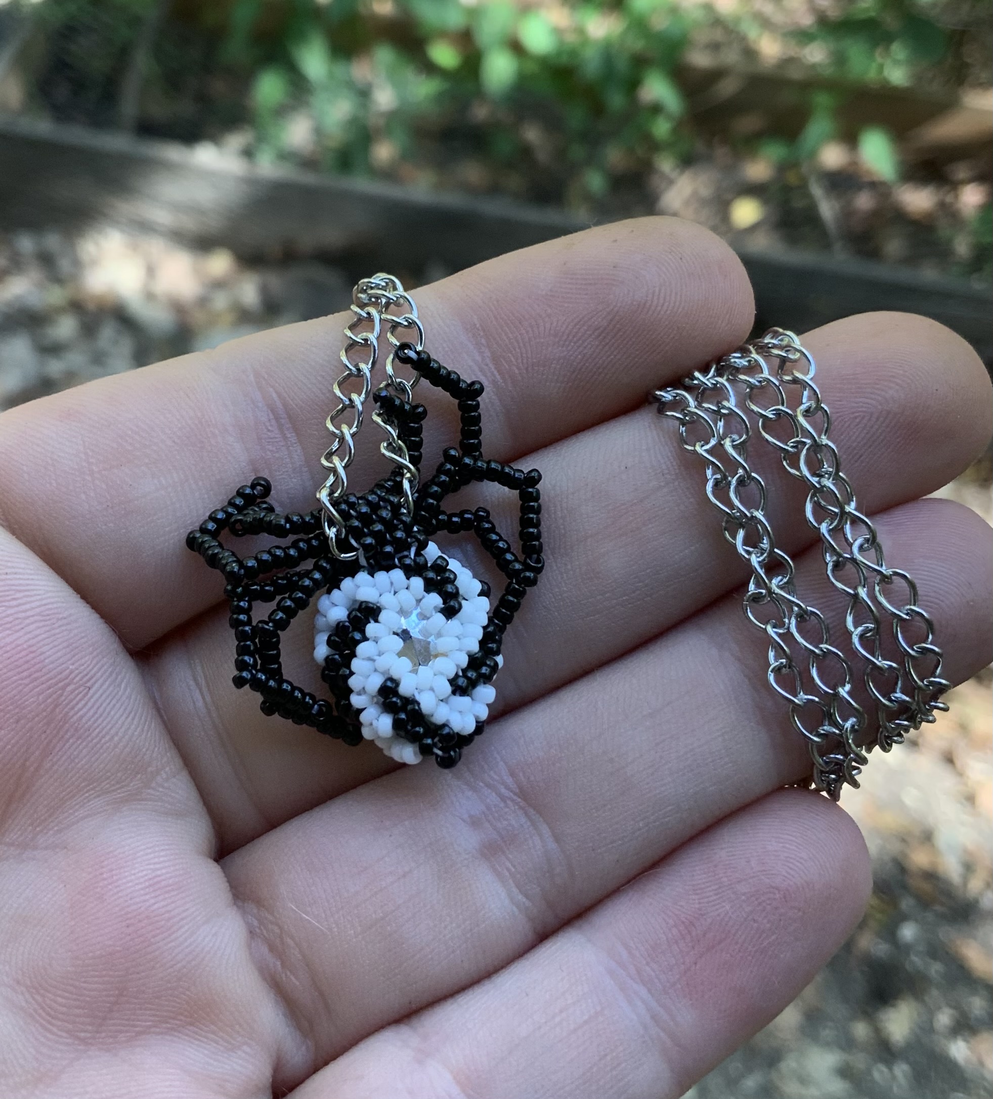 Black and white beaded spider pendant 