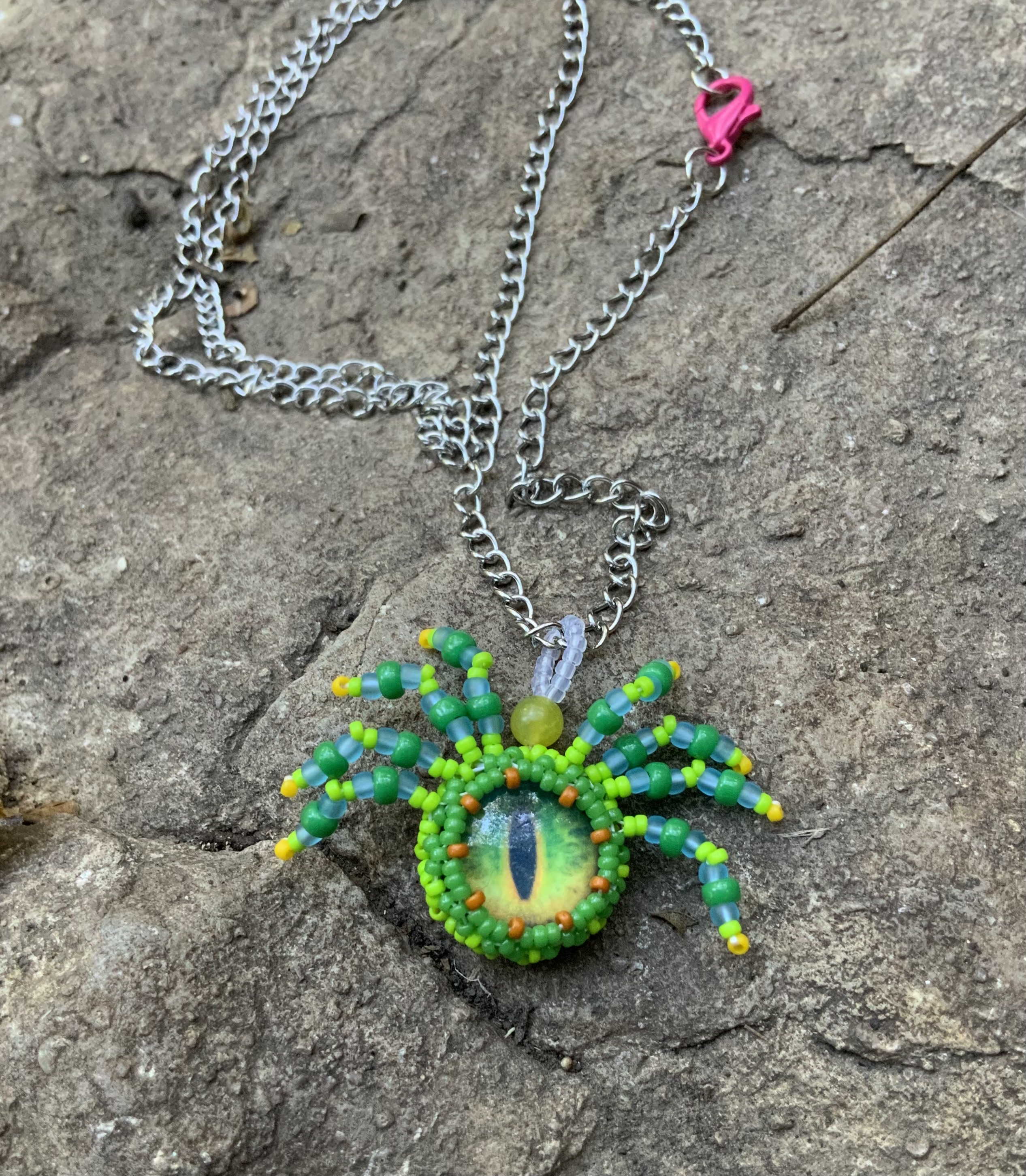 Green machine beaded spider pendant