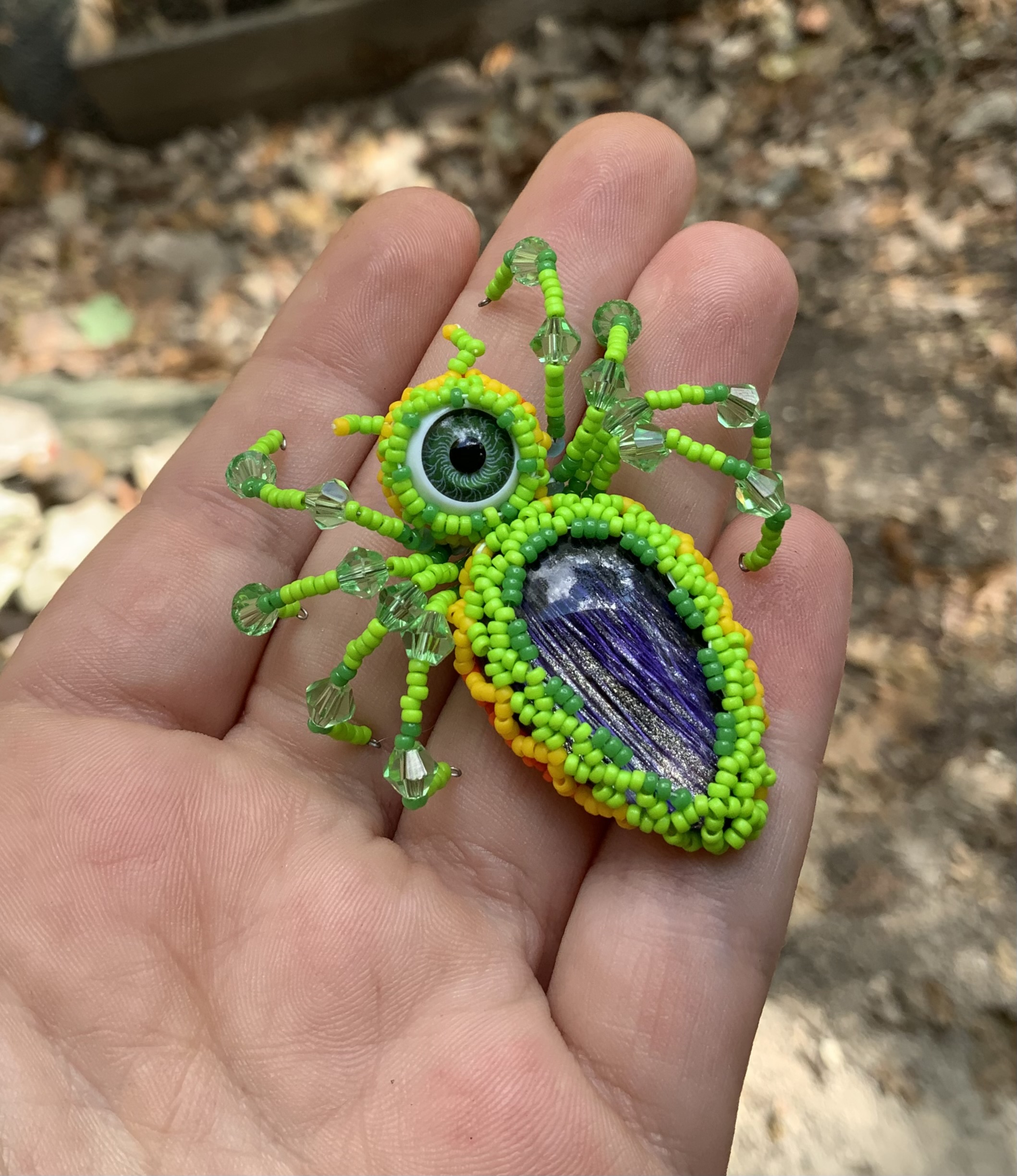 Neon green fire belly beaded spider eye guy