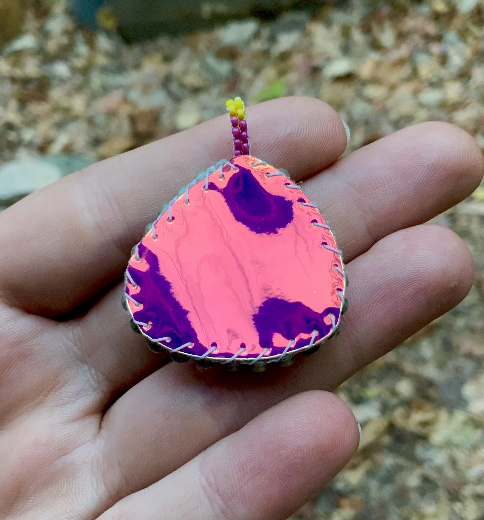 Glow in the dark earthy sunshine beaded pendant