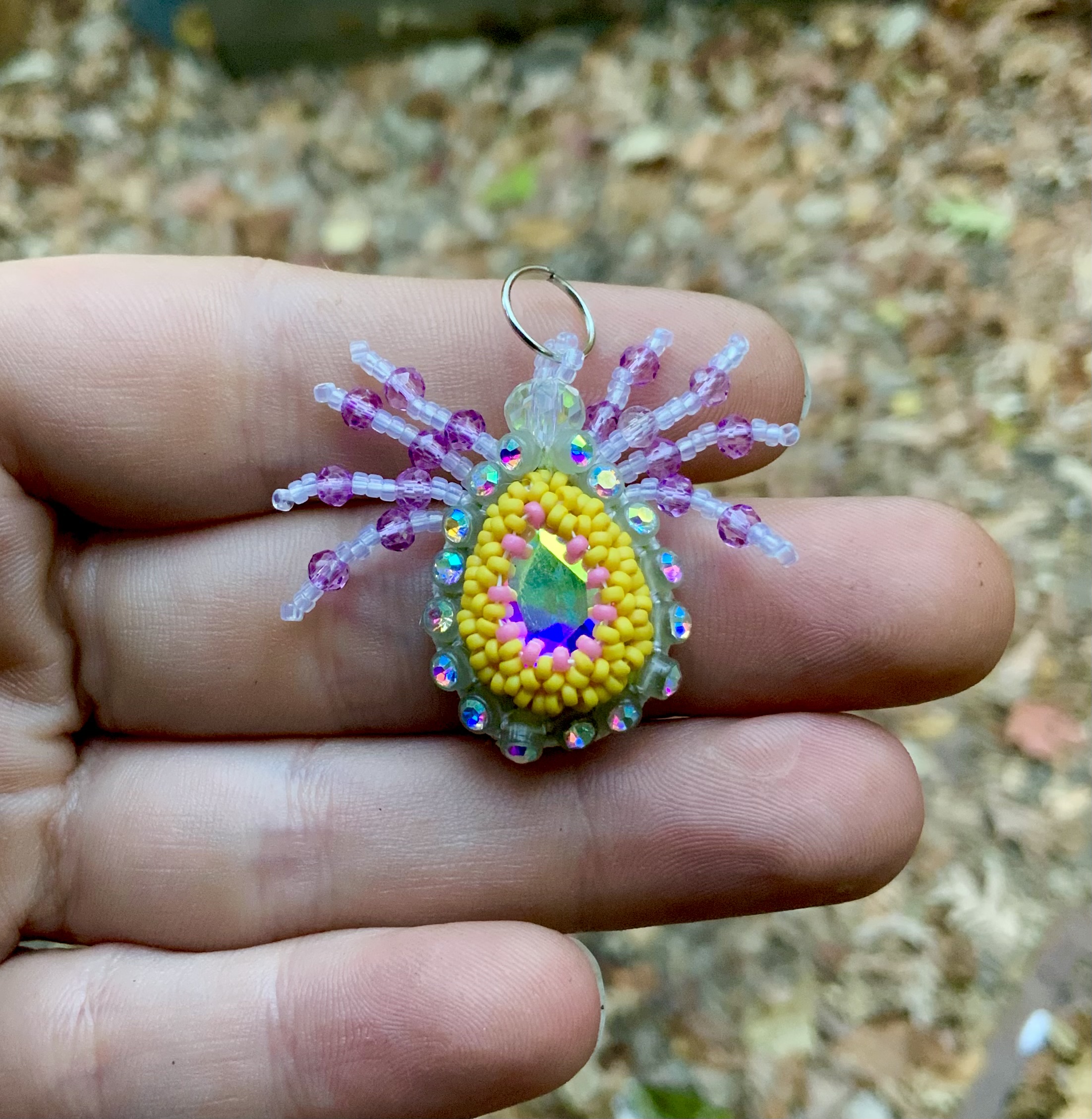 Beaded glow in the dark spider pendant