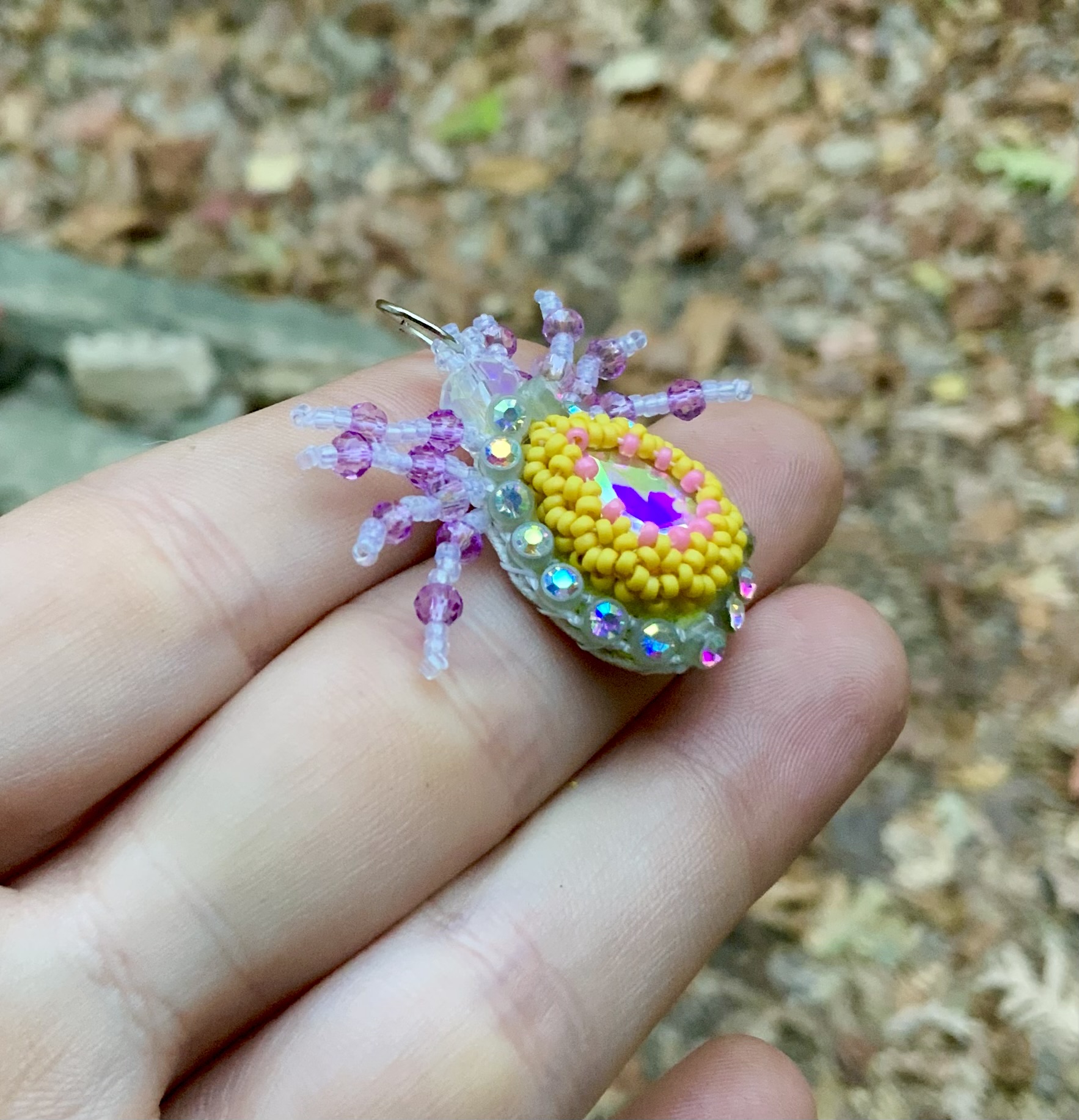 Beaded glow in the dark spider pendant